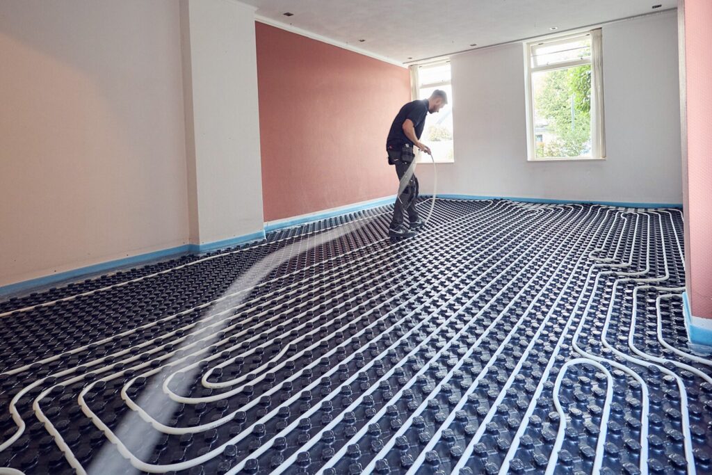 Vloerverwarming dat wordt gelegd door Faber Comfortvloer
